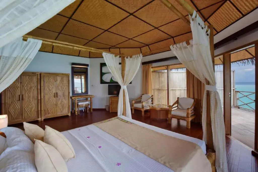 Bed in Angaga Island Resort and Spa Bed in Angaga Island Resort and Spa