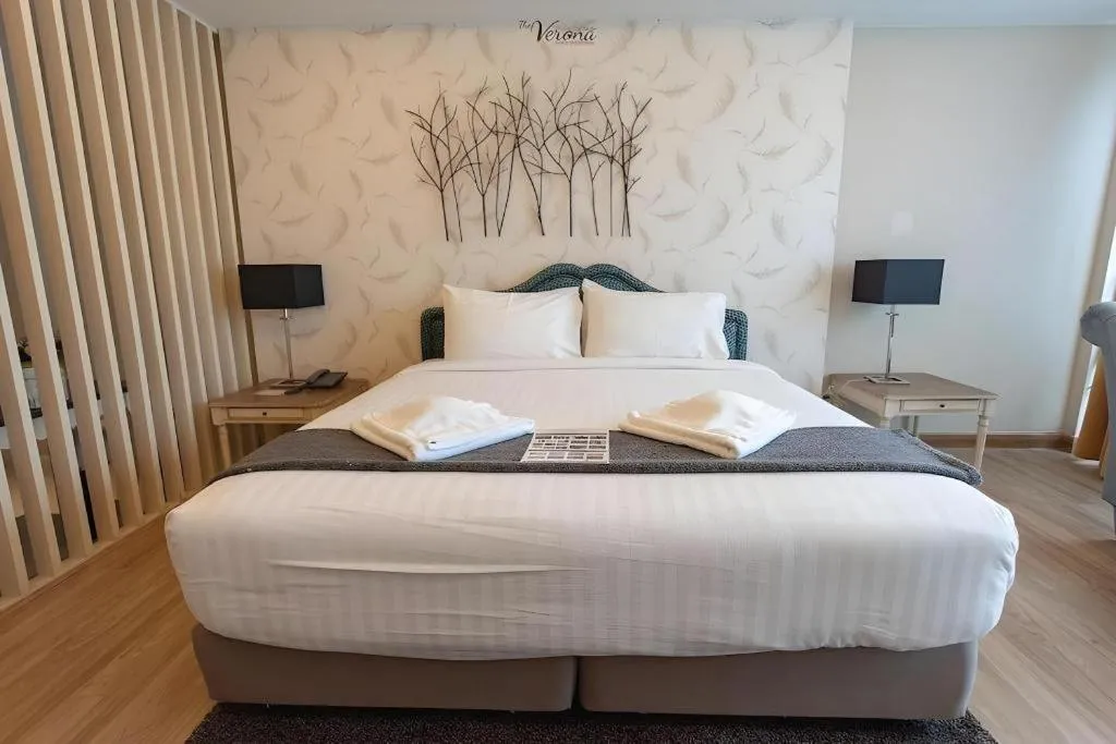 Bed in Verona Boutique Hotel - The Verona Co., Ltd