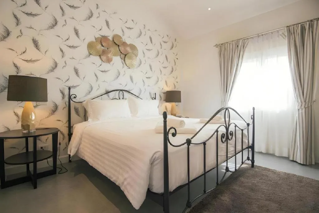 Bed in Verona Boutique Hotel - The Verona Co., Ltd