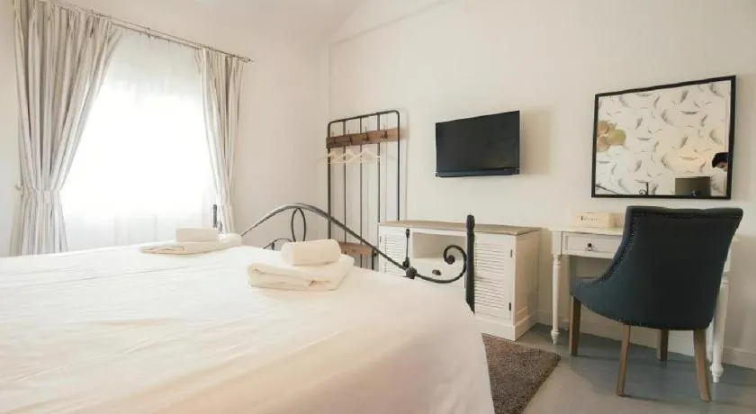 Bed in Verona Boutique Hotel - The Verona Co., Ltd