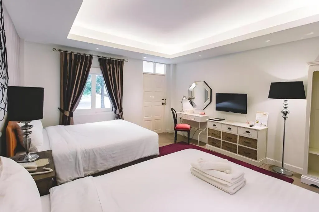 Bed in Verona Boutique Hotel - The Verona Co., Ltd