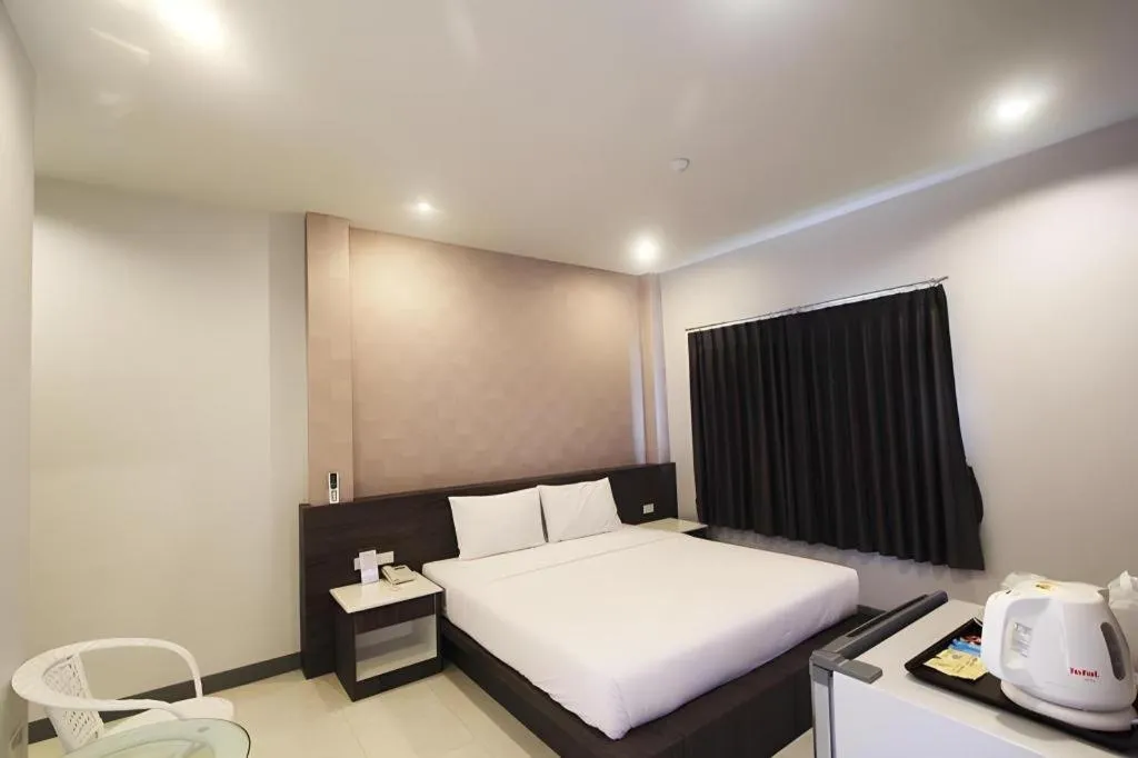 Bed in Seree Grand Resort