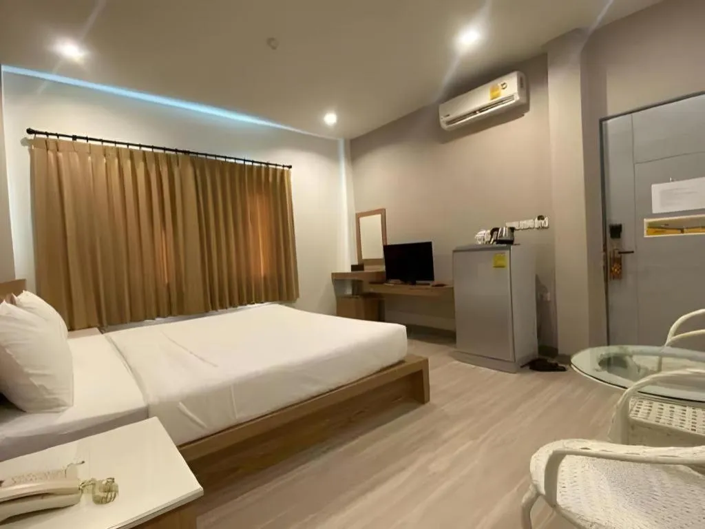 Bed in Seree Grand Resort