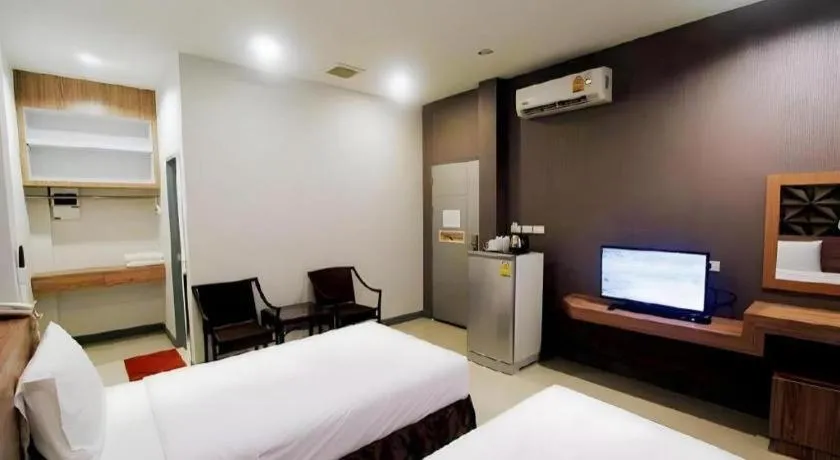 Bed in Seree Grand Resort