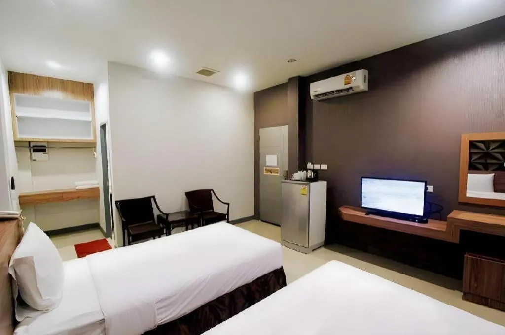 Bed in Seree Grand Resort