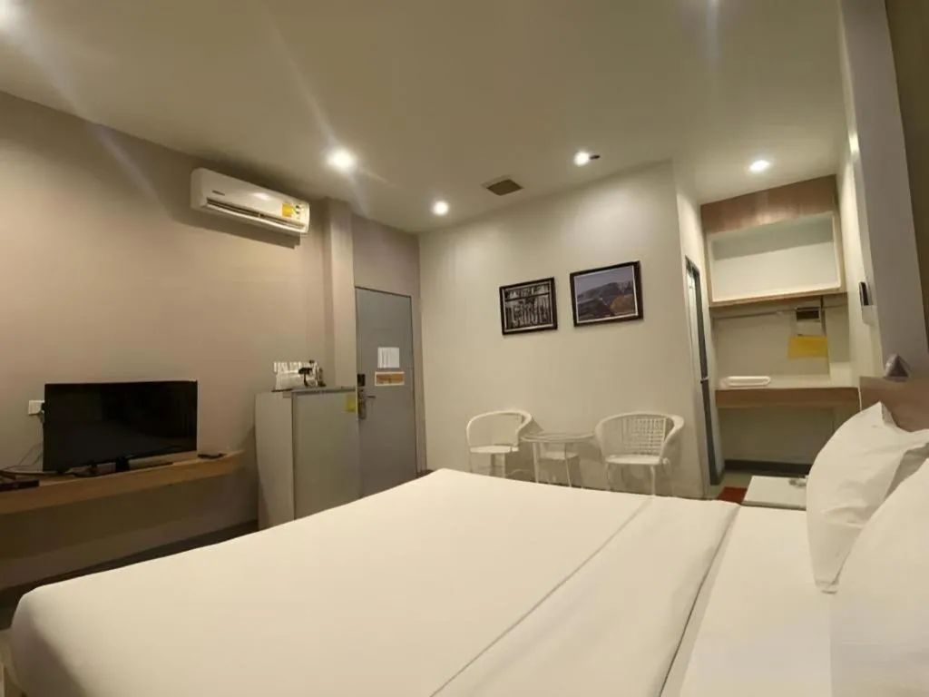 Bed in Seree Grand Resort