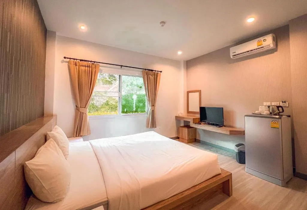 Bed in Seree Grand Resort