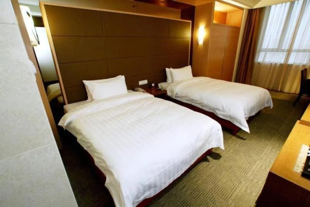 Bed in Huana Hotel Minhang Shanghai