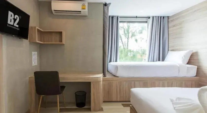 Bed in B2 Ubon Premier Hotel Bed in B2 Ubon Premier Hotel