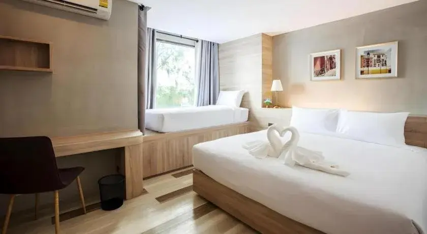 Bed in B2 Ubon Premier Hotel Bed in B2 Ubon Premier Hotel