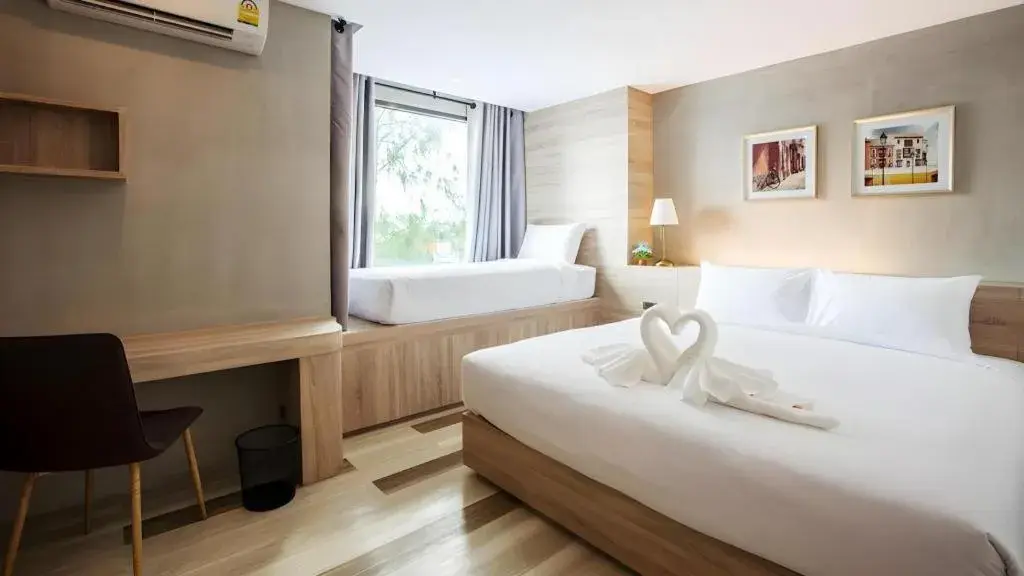 Bed in B2 Ubon Premier Hotel Bed in B2 Ubon Premier Hotel