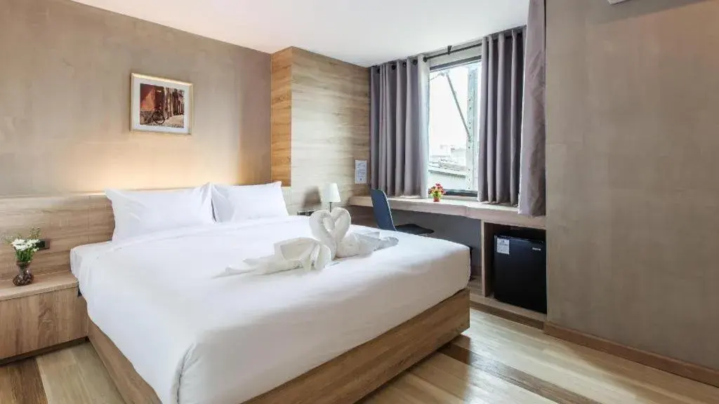 Bed in B2 Ubon Premier Hotel Bed in B2 Ubon Premier Hotel