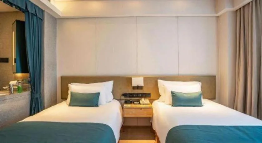 Bed in New Century Kylie Hotel Ningbo