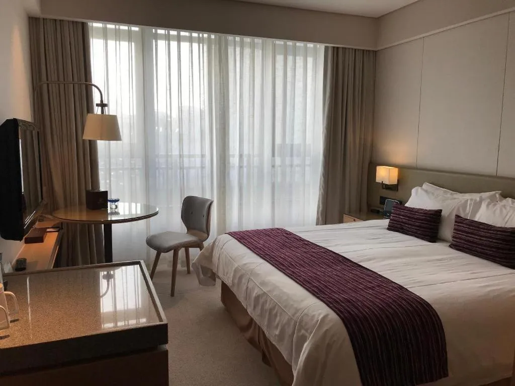 Bed in New Century Kylie Hotel Ningbo