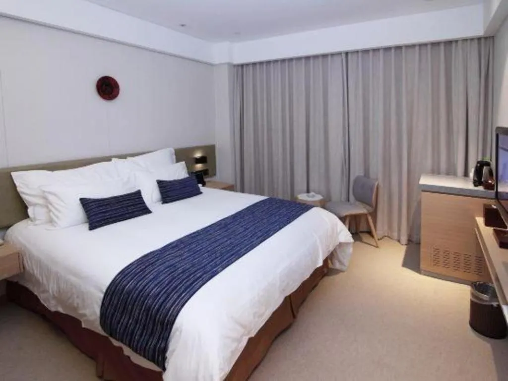 Bed in New Century Kylie Hotel Ningbo
