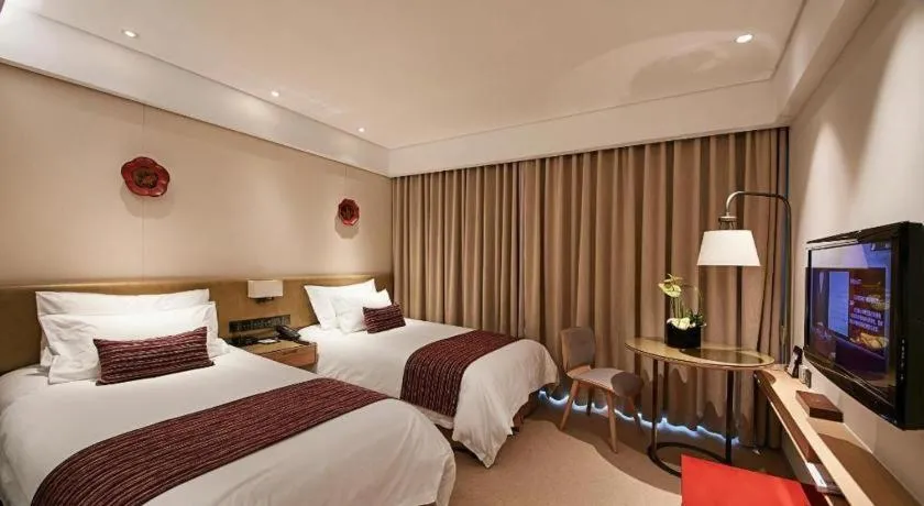 Bed in New Century Kylie Hotel Ningbo