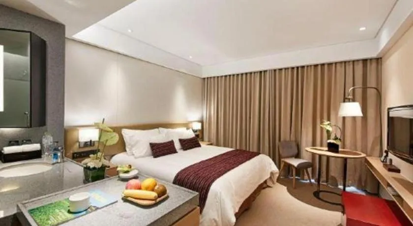 Bed in New Century Kylie Hotel Ningbo
