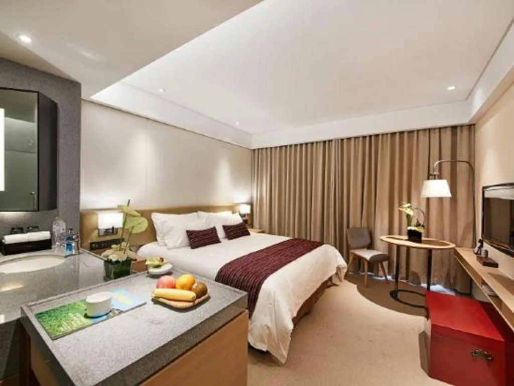 Bed in New Century Kylie Hotel Ningbo