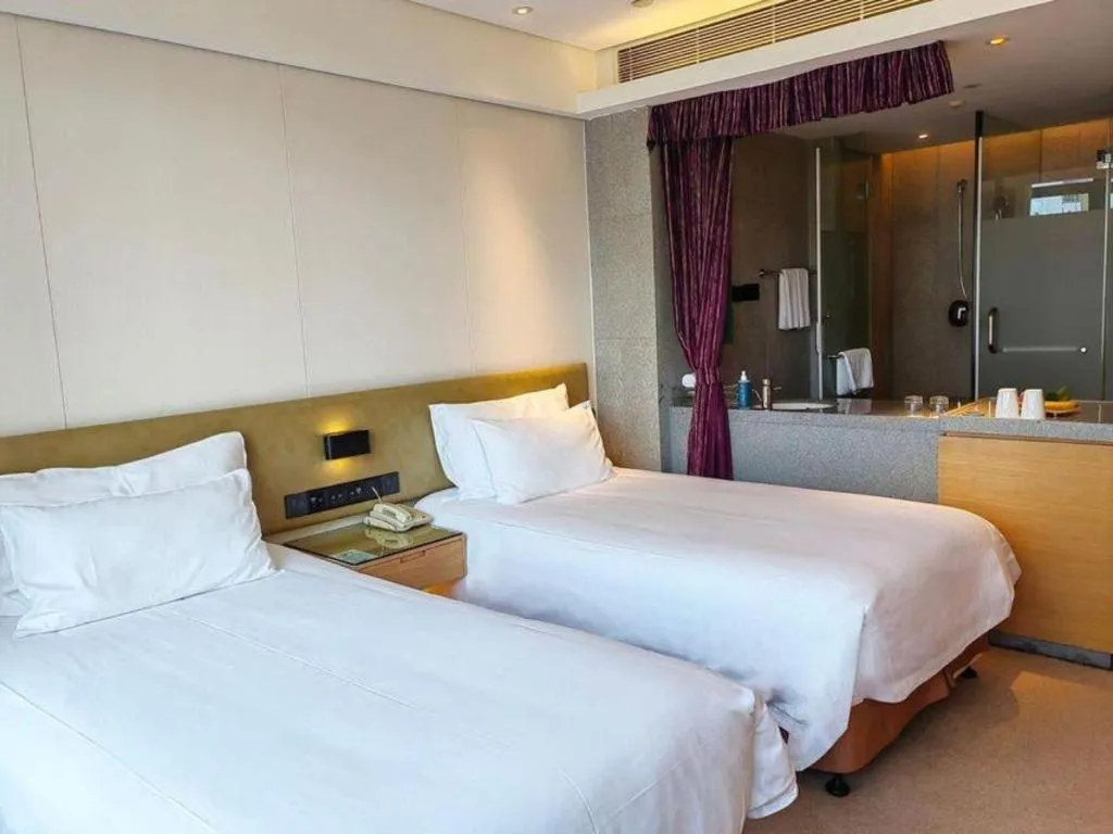 Bed in New Century Kylie Hotel Ningbo