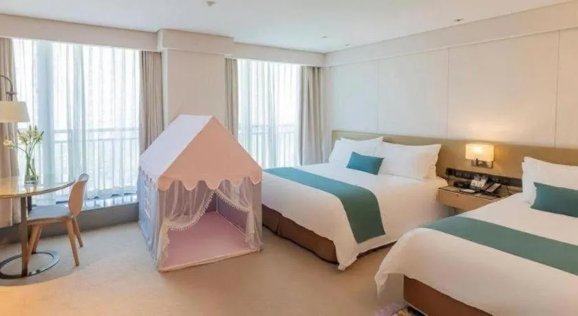 Bed in New Century Kylie Hotel Ningbo