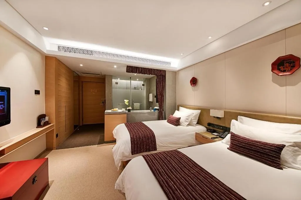 Bed in New Century Kylie Hotel Ningbo