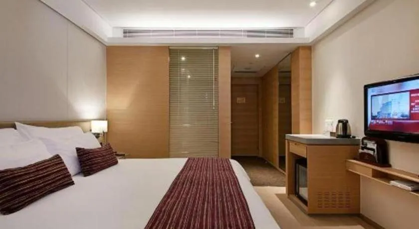 Bed in New Century Kylie Hotel Ningbo