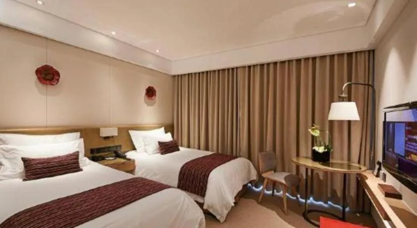 Bed in New Century Kylie Hotel Ningbo