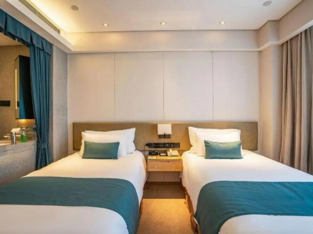 Bed in New Century Kylie Hotel Ningbo