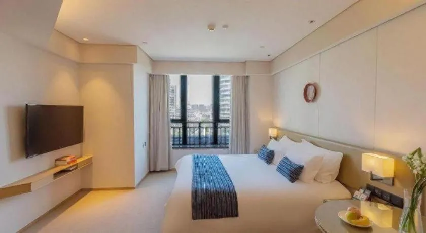 Bed in New Century Kylie Hotel Ningbo
