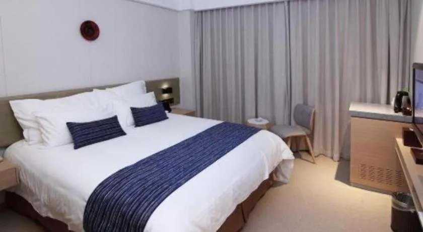 Bed in New Century Kylie Hotel Ningbo