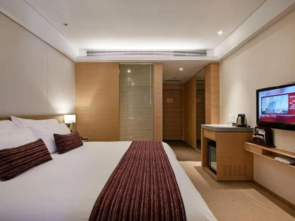 Bed in New Century Kylie Hotel Ningbo