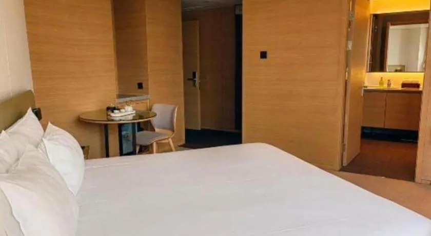 Bed in New Century Kylie Hotel Ningbo