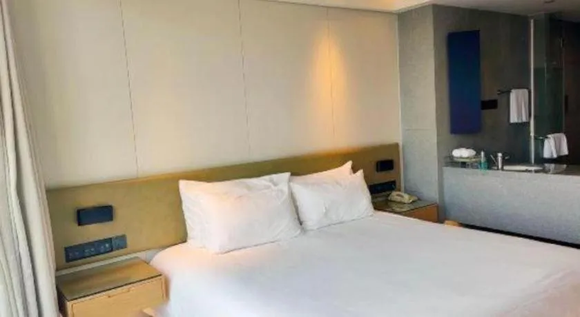 Bed in New Century Kylie Hotel Ningbo