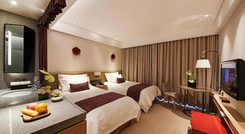 Bed in New Century Kylie Hotel Ningbo