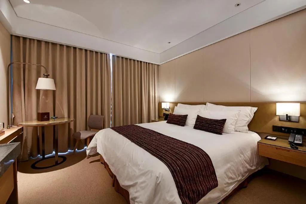 Bed in New Century Kylie Hotel Ningbo