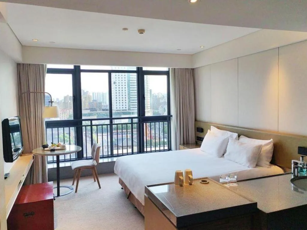 Bed in New Century Kylie Hotel Ningbo