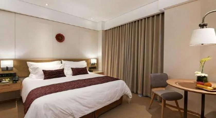 Bed in New Century Kylie Hotel Ningbo