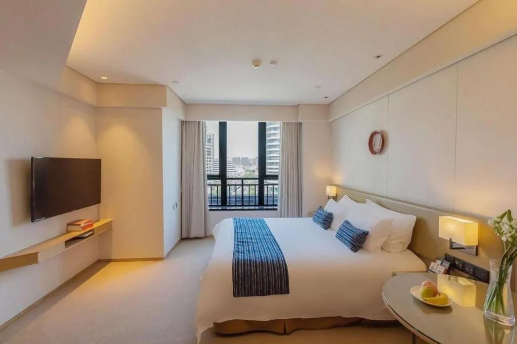 Bed in New Century Kylie Hotel Ningbo