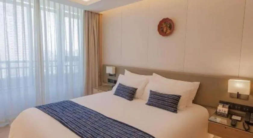 Bed in New Century Kylie Hotel Ningbo