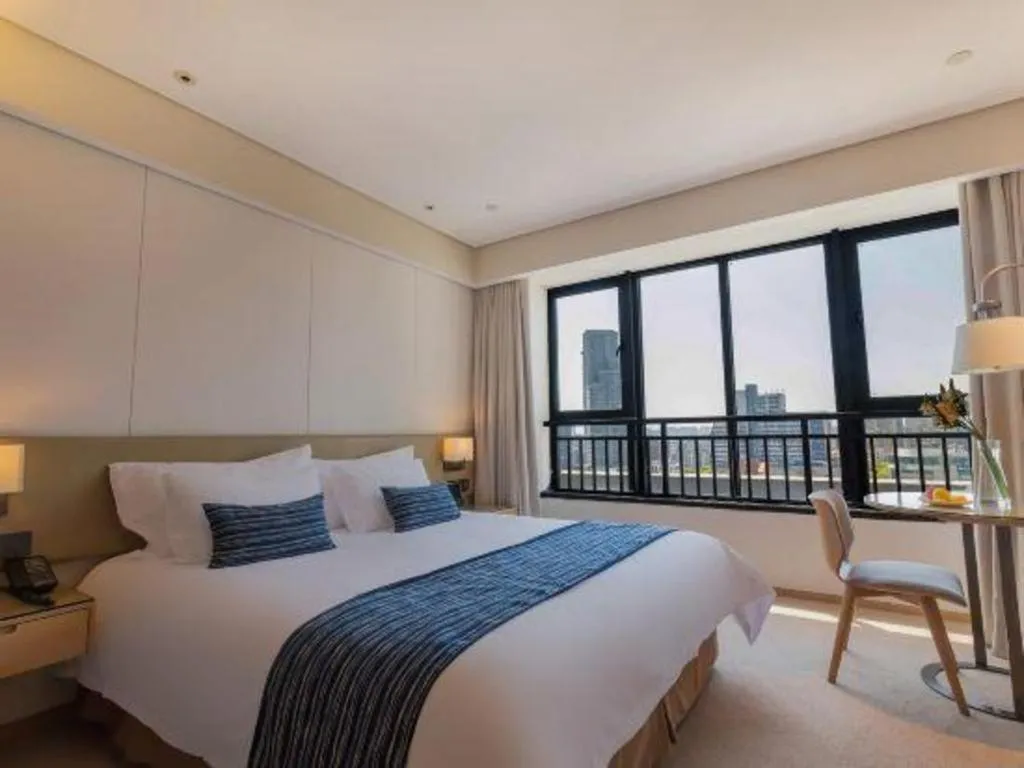 Bed in New Century Kylie Hotel Ningbo