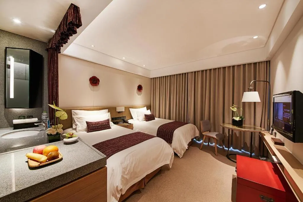 Bed in New Century Kylie Hotel Ningbo
