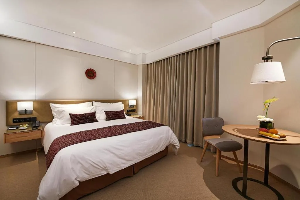 Bed in New Century Kylie Hotel Ningbo