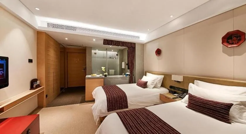 Bed in New Century Kylie Hotel Ningbo