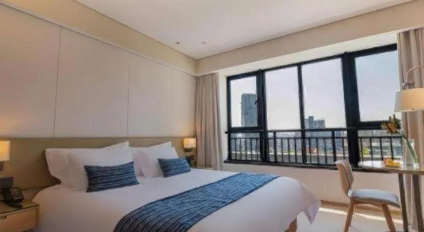 Bed in New Century Kylie Hotel Ningbo