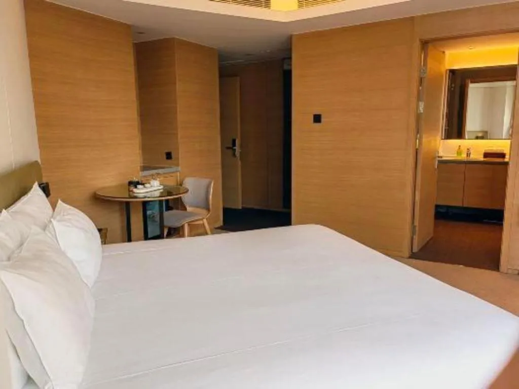 Bed in New Century Kylie Hotel Ningbo