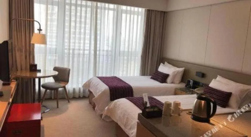 Bed in New Century Kylie Hotel Ningbo