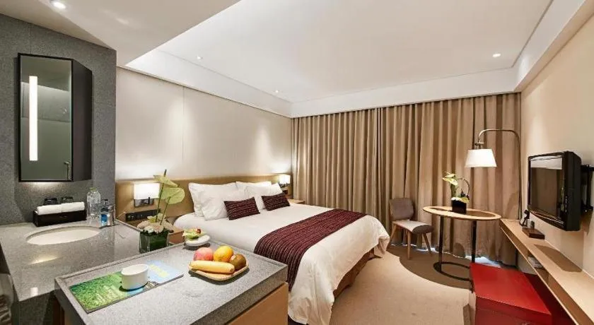 Bed in New Century Kylie Hotel Ningbo