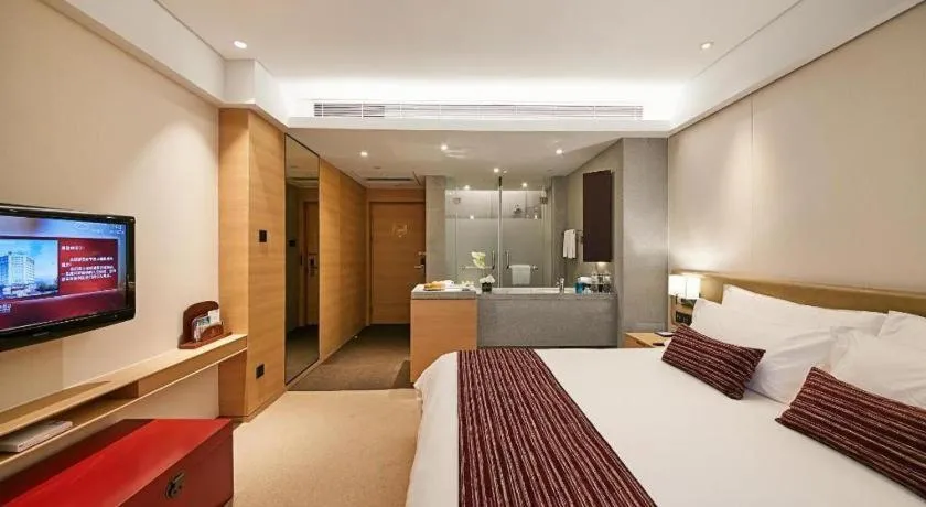 Bed in New Century Kylie Hotel Ningbo
