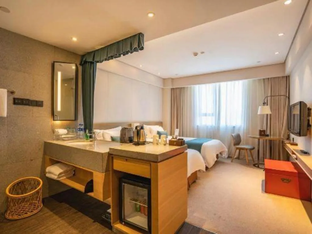Bed in New Century Kylie Hotel Ningbo