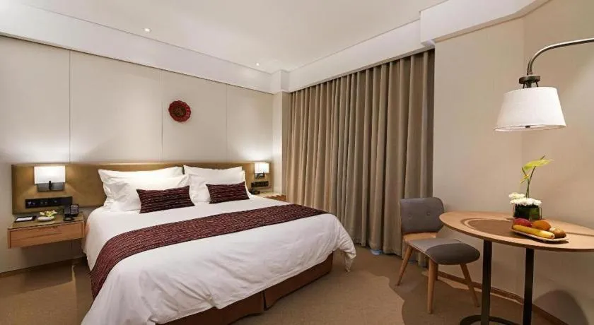 Bed in New Century Kylie Hotel Ningbo